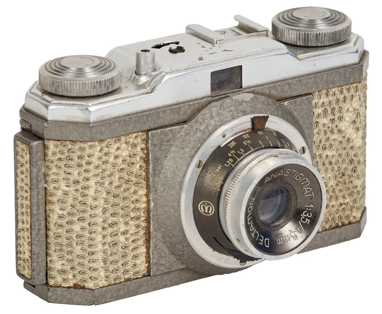 a snakeskin-covered 35mm camera