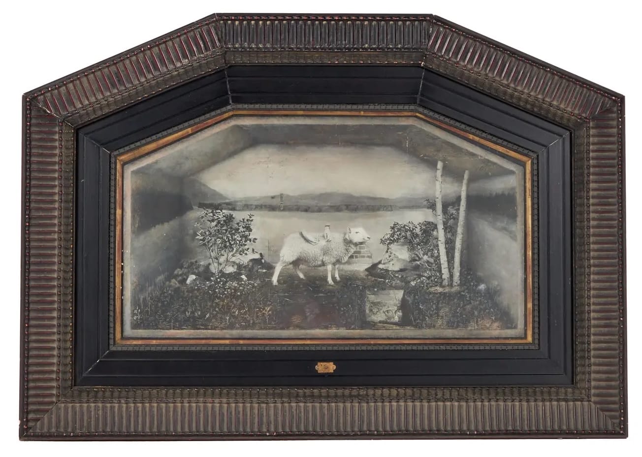 a framed surrealist photo collage centered around a sheep